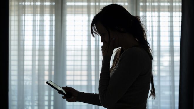 Woman checking phone