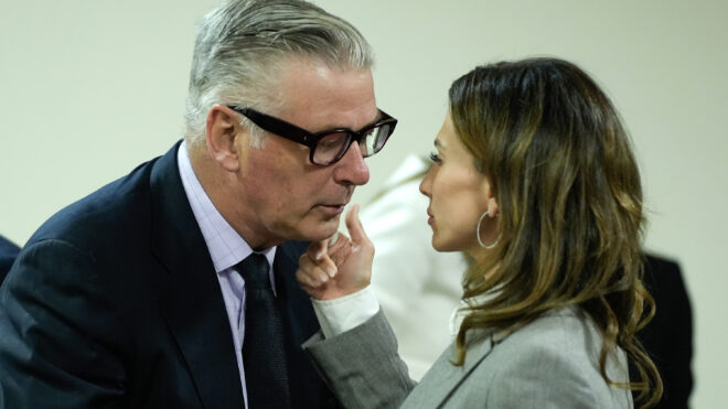 Hilaria Baldwin, right, speaks to her husband, actor Alec Baldwin, during his trial for involuntary manslaughter in First Judicial District Court on July 12, 2024, in Santa Fe, New Mexico. (Ramsay de Give/Pool/Getty Images/TNS)