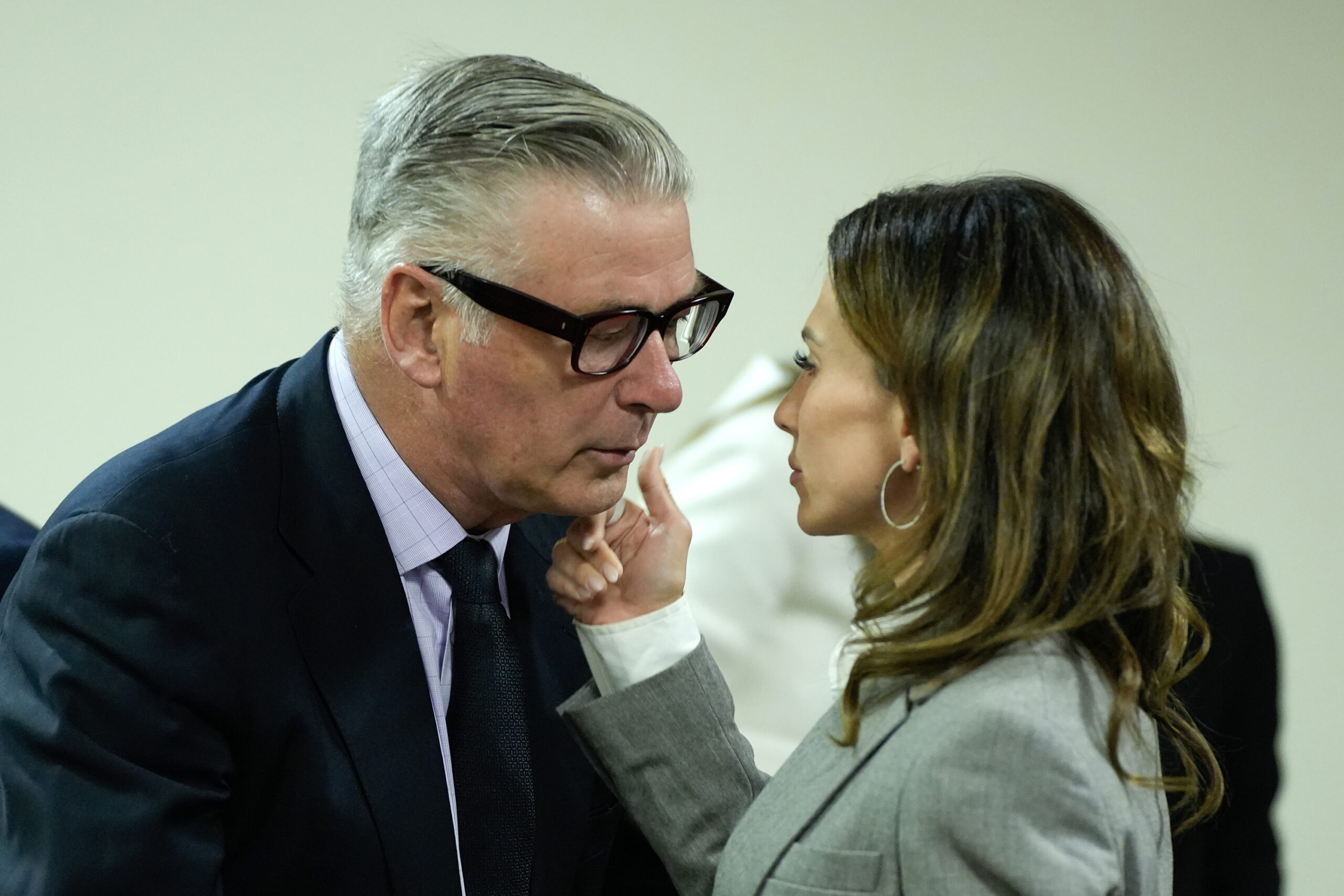 Hilaria Baldwin, right, speaks to her husband, actor Alec Baldwin, during his trial for involuntary manslaughter in First Judicial District Court on July 12, 2024, in Santa Fe, New Mexico. (Ramsay de Give/Pool/Getty Images/TNS)