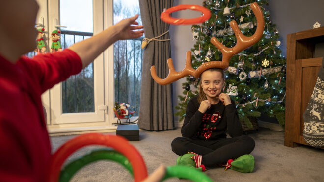 Kids playing antler ring toss