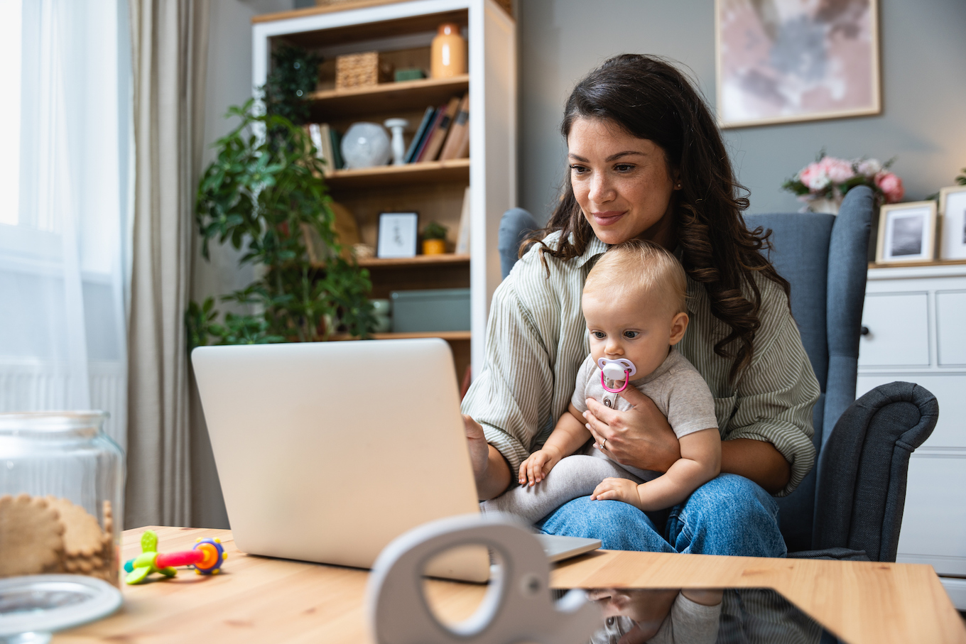 Mom with baby on a computer