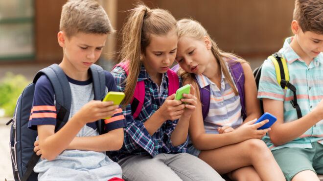 kids on phones at school